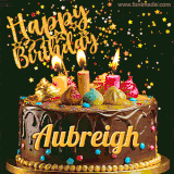 A delightful chocolate birthday cake with bright candles and 'Happy Birthday Aubreigh' written in gold amidst a shower of animated stars.