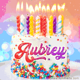 A cheerful white birthday cake with multicolor sprinkles, lit candles, and 'Aubrey' written in vibrant letters, in an animated GIF.