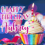 A festive animated GIF featuring a colorful cupcake with a single lit candle, sprinkles, and 'Happy Birthday Aubrey' text against a sparkling, celebratory background.