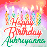 Bright birthday candles with rainbow flames on a cake, alongside the text 'Happy Birthday Aubreyanna' in vibrant script in this celebratory animated GIF.