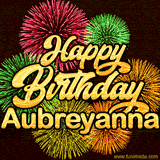 Golden text reading 'Happy Birthday Aubreyanna' surrounded by vibrant fireworks in red, green, and yellow, set against a dark background in this celebratory birthday GIF.