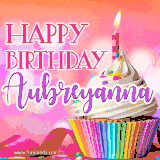 A vibrant birthday GIF featuring a rainbow-colored cupcake topped with white frosting, sprinkles, and a lit candle. The text reads 'Happy Birthday Aubreyanna' in bold pink and violet letters with white outline.