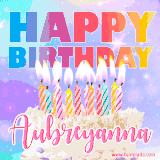 A vibrant animated name GIF with the words 'Happy Birthday Aubreyanna' with colorful candles on a creamy cake. The background sparkles with pastel shades, adding a festive touch.
