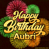 Golden text reading 'Happy Birthday Aubri' surrounded by vibrant fireworks in red, green, and yellow, set against a dark background in this celebratory birthday GIF.