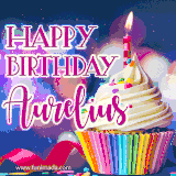 A festive animated GIF featuring a colorful cupcake with a single lit candle, sprinkles, and 'Happy Birthday Aurelius' text against a sparkling, celebratory background.