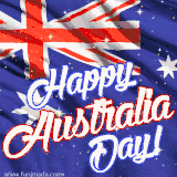 A waving Australian flag in motion with twinkling gold stars and bold white and red script text reading 'Happy Australia Day!' across the blue background.