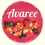 Beautifully decorated red velvet berry birthday cake with vibrant fruits and a glowing 'Avaree' name, adding a touch of sweetness and sparkle.