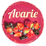 Beautifully decorated red velvet berry birthday cake with vibrant fruits and a glowing 'Avarie' name, adding a touch of sweetness and sparkle.