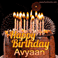 A rich chocolate cake topped with glowing birthday candles and surrounded by bright fireworks. The animated GIF displays the message 'Happy Birthday Avyaan' in golden text.