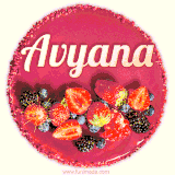 Beautifully decorated red velvet berry birthday cake with vibrant fruits and a glowing 'Avyana' name, adding a touch of sweetness and sparkle.