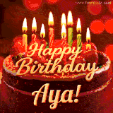 Beautifully decorated red velvet berry birthday cake with vibrant fruits and a glowing 'Aya' name, adding a touch of sweetness and sparkle.