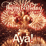 Close-up of metallic red and gold party balloons tied to a decorative present box with Ayas name on a gold stand.
