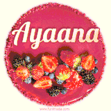 Beautifully decorated red velvet berry birthday cake with vibrant fruits and a glowing 'Ayaana' name, adding a touch of sweetness and sparkle.