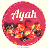 Beautifully decorated red velvet berry birthday cake with vibrant fruits and a glowing 'Ayah' name, adding a touch of sweetness and sparkle.