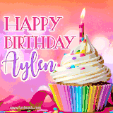 A vibrant birthday GIF featuring a rainbow-colored cupcake topped with white frosting, sprinkles, and a lit candle. The text reads 'Happy Birthday Aylen' in bold pink and violet letters with white outline.