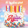 Personalized for Aylin elegant birthday cake adorned with rainbow sprinkles, colorful candles and glitter
