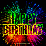 Vibrant rainbow fireworks with glowing neon 'HAPPY BIRTHDAY' text in the center.