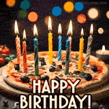 A pizza decorated with lit candles, surrounded by bokeh lights and 'HAPPY BIRTHDAY!' text.