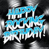 A rock-themed birthday Video with white and cyan text reads 'Happy Rocking Birthday!' on top of a black vinyl record background. The text is styled in an edgy, hard rock font.