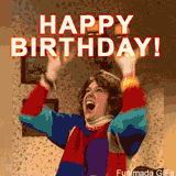 A hilarious birthday GIF featuring Kristen Wiig's surprise-loving character from SNL. She wears a colorful sweater and yells with extreme excitement. The caption reads 'HAPPY BIRTHDAY!'.