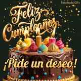 Tarjeta festiva que muestra una tarta de chocolate decorada con dulces de colores, coronada por la frase brillante ¡Pide un deseo! y lluvia de purpurina dorada.