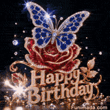 Visual of a jeweled butterfly with blue sapphire wings perching on a red rose above 3D gold Happy Birthday script set with brilliant diamonds on dark black.