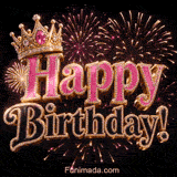 Pink glittery Happy Birthday lettering trimmed in gold and studded with sparkling stones sits beneath a jeweled crown as bright pink gold and white fireworks burst across a dark background illuminating the festive scene