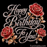 Ornate GIF, jeweled text in flowing silver script with multicolored stones forms Happy Birthday To You while detailed red gemstone roses and golden foliage with dangling crystals frame the design