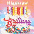 Personalized for Brittany elegant birthday cake adorned with rainbow sprinkles, colorful candles and glitter
