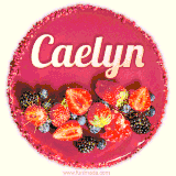 Beautifully decorated red velvet berry birthday cake with vibrant fruits and a glowing 'Caelyn' name, adding a touch of sweetness and sparkle.