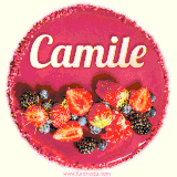 Beautifully decorated red velvet berry birthday cake with vibrant fruits and a glowing 'Camile' name, adding a touch of sweetness and sparkle.