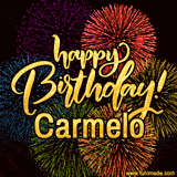 A vibrant display of multicolor fireworks with the text 'Happy Birthday Carmelo' written in gold, glowing beautifully in front of the explosive background.