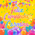 A bright and festive GIF with the text 'Feliz Cumpleaños Carmina' in Spanish in colorful fonts, surrounded by confetti, balloons, and festive banners on a vibrant yellow background.