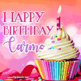 A vibrant birthday GIF featuring a rainbow-colored cupcake topped with white frosting, sprinkles, and a lit candle. The text reads 'Happy Birthday Carmo' in bold pink and violet letters with white outline.
