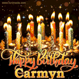 A glowing personalized birthday GIF with name Carmyn featuring lit candles with intricate designs, warm lighting, and the text 'Happy Birthday' in an elegant font.