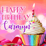 A vibrant birthday GIF featuring a rainbow-colored cupcake topped with white frosting, sprinkles, and a lit candle. The text reads 'Happy Birthday Carmyn' in bold pink and violet letters with white outline.