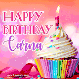 A vibrant birthday GIF featuring a rainbow-colored cupcake topped with white frosting, sprinkles, and a lit candle. The text reads 'Happy Birthday Carna' in bold pink and violet letters with white outline.