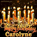 A glowing personalized birthday GIF with name Carolyne featuring lit candles with intricate designs, warm lighting, and the text 'Happy Birthday' in an elegant font.