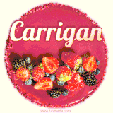 Beautifully decorated red velvet berry birthday cake with vibrant fruits and a glowing 'Carrigan' name, adding a touch of sweetness and sparkle.