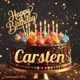 Rich chocolate cake decorated with sprinkles, colorful icing, lit candles, and the name Carsten in bold golden script.