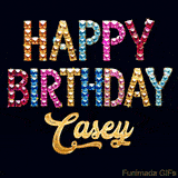 Vibrant luxury birthday greeting card for Casey, showing glittering gemstone letters and golden calligraphy on a dark background with twinkling shine effects.