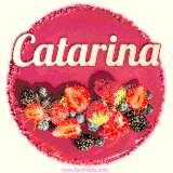 Beautifully decorated red velvet berry birthday cake with vibrant fruits and a glowing 'Catarina' name, adding a touch of sweetness and sparkle.