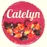 Beautifully decorated red velvet berry birthday cake with vibrant fruits and a glowing 'Catelyn' name, adding a touch of sweetness and sparkle.