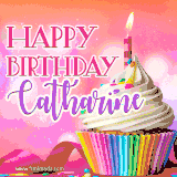 A vibrant birthday GIF featuring a rainbow-colored cupcake topped with white frosting, sprinkles, and a lit candle. The text reads 'Happy Birthday Catharine' in bold pink and violet letters with white outline.