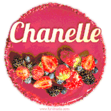 Beautifully decorated red velvet berry birthday cake with vibrant fruits and a glowing 'Chanelle' name, adding a touch of sweetness and sparkle.