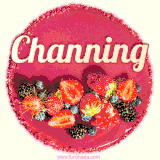 Beautifully decorated red velvet berry birthday cake with vibrant fruits and a glowing 'Channing' name, adding a touch of sweetness and sparkle.
