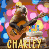 Animated birthday GIF showing a capybara playing guitar and singing beside a birthday cake with the name Charley in large letters and colorful bokeh lights in the background.
