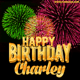A captivating GIF with bursts of green, pink, and orange fireworks lighting up the night sky, accompanied by 'Happy Birthday Charley' in glowing golden text.