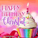 A vibrant birthday GIF featuring a rainbow-colored cupcake topped with white frosting, sprinkles, and a lit candle. The text reads 'Happy Birthday Christal' in bold pink and violet letters with white outline.