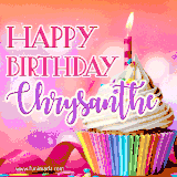 A vibrant birthday GIF featuring a rainbow-colored cupcake topped with white frosting, sprinkles, and a lit candle. The text reads 'Happy Birthday Chrysanthe' in bold pink and violet letters with white outline.